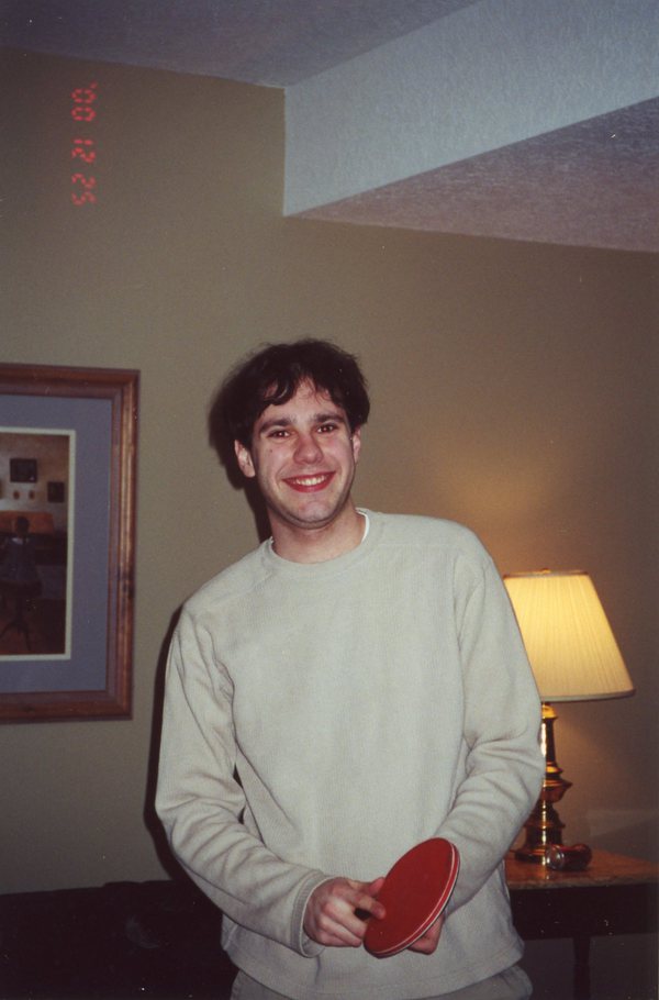 Dan playing ping pong, christmas 2000